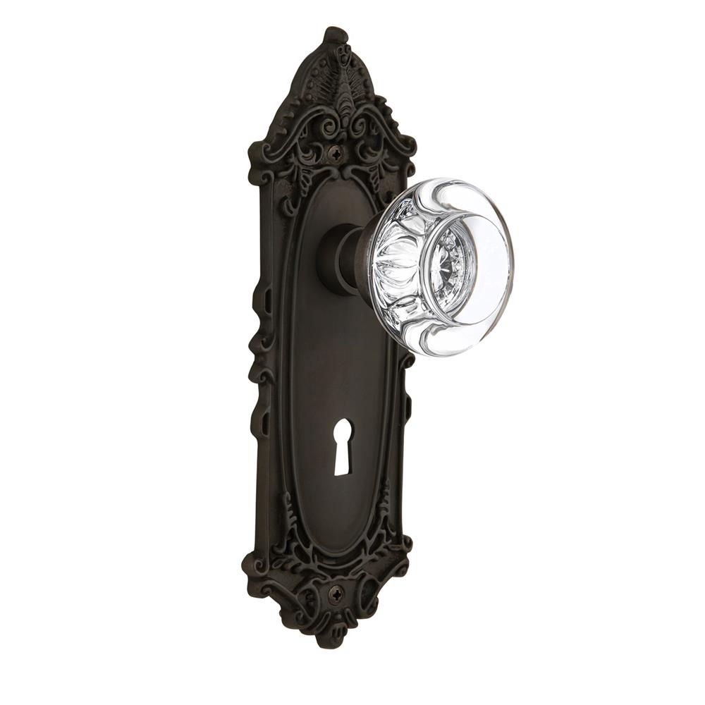 Nostalgic Warehouse VICRCC Passage Knob Victorian Plate with Round Clear Crystal Knob with Keyhole in Oil Rubbed Bronze